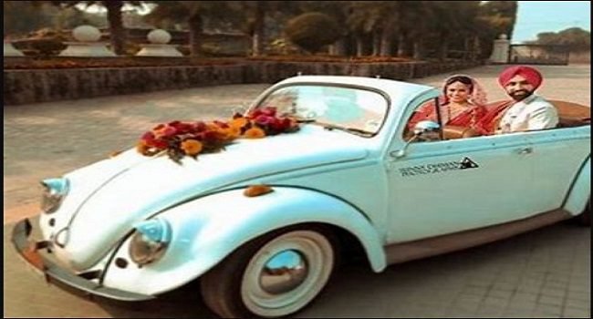 Retro Car Ride entry of bride and groom